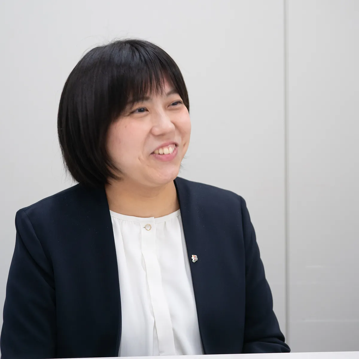 笑顔で開発のこだわりを語る川戸さん